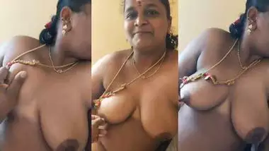 Stepson squeezes his stepmom?s big boob in nude MMS